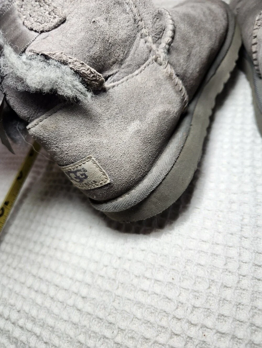 UGG Gray Bow Back Shearling Boots Flawed